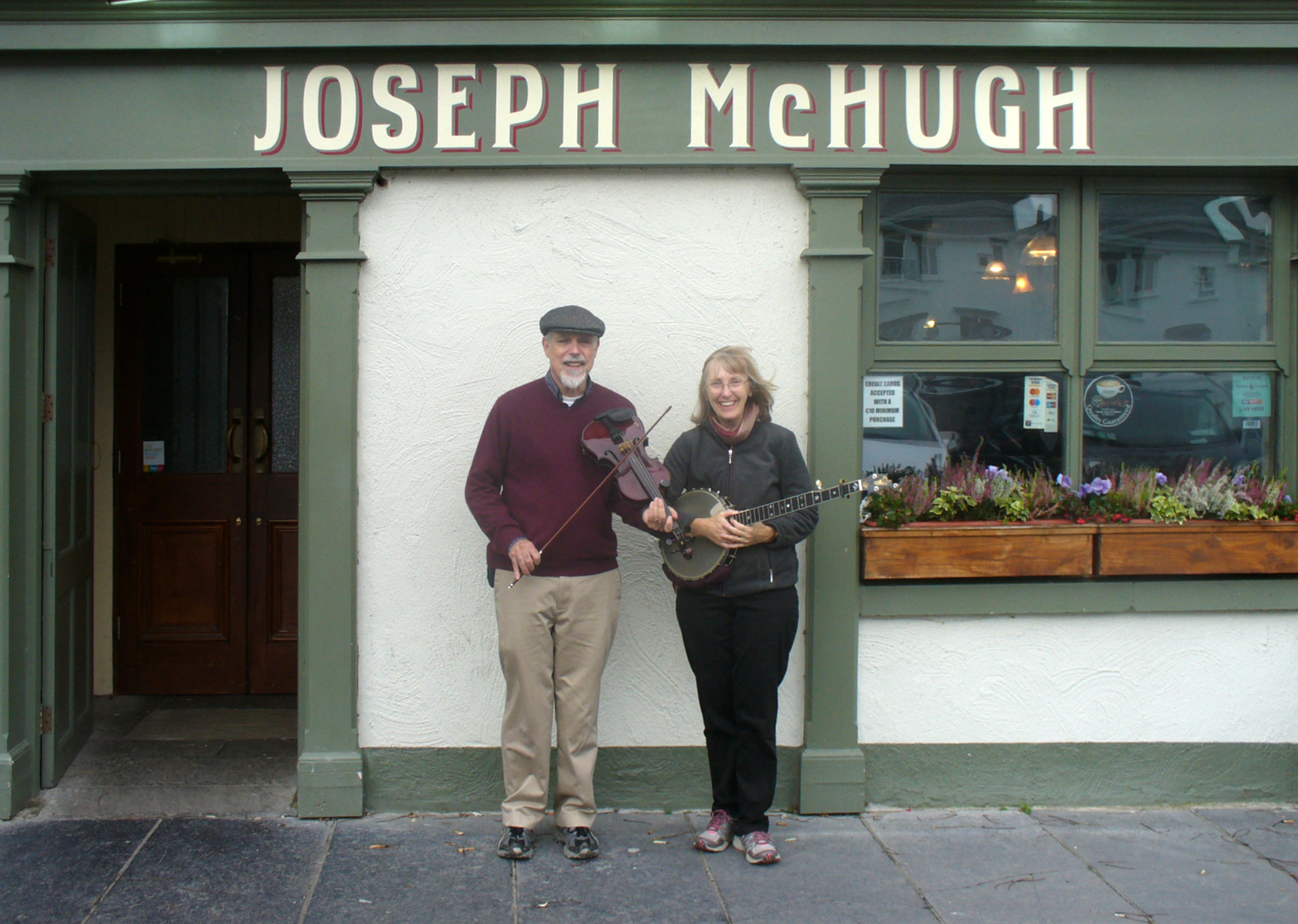 Joe and Paula McHugh in front of Joseph McHugh Pub is Lisconnor, Ireland